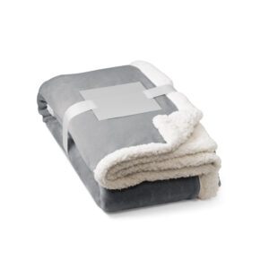 Manta reversível em tecido polar (190 g/m²) acetinado com forro sherpa (225 g/m²), - Brinde Corporativo Personalizado | Enova