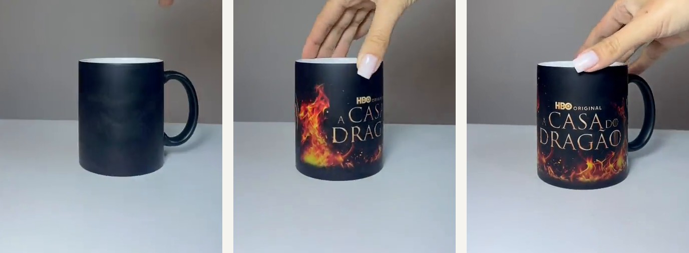 Caneca da HBO em três momentos: preta, com a arte surgindo e com a arte completa